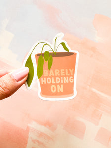 Barely Holding On Sticker
